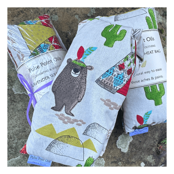 childrens lavender scented wheat bag in indian bear and tipi cotton print